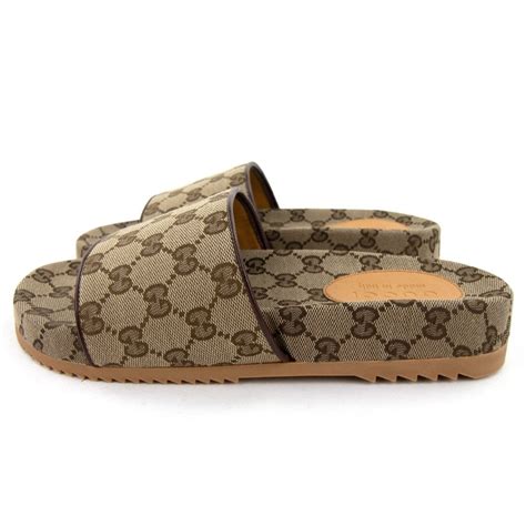 gucci slides gg canvas|canvas gucci slides women.